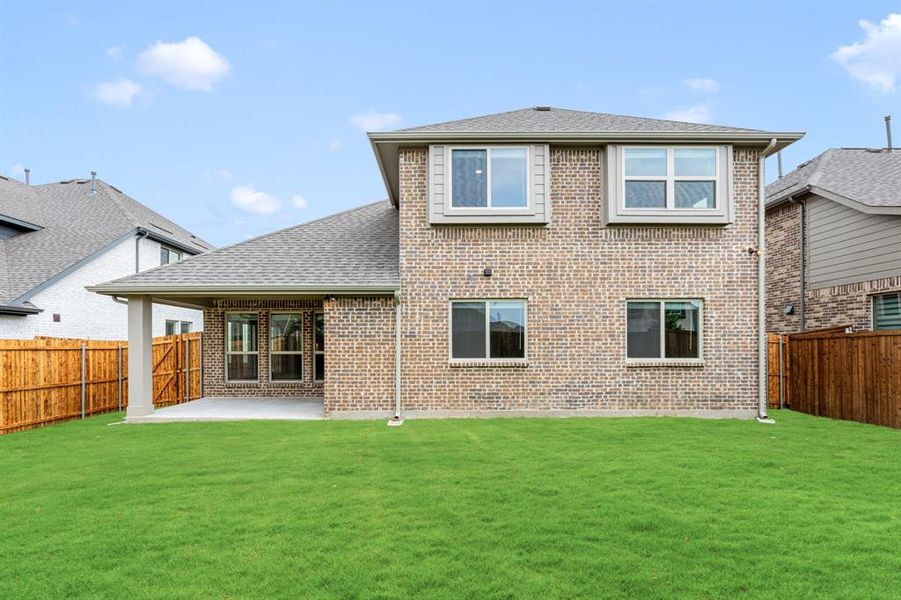 Front exterior of a new home in Legacy Ranch Classic 55, Melissa, TX, highlighting curb appeal (Image 2). Front exterior of a new home in Legacy Ranch Classic 55, Melissa, TX, highlighting curb appeal (Image 2).