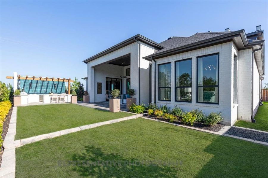Exterior details and patio area of a home in The Parks at Wilson Creek, Celina (Image 22).