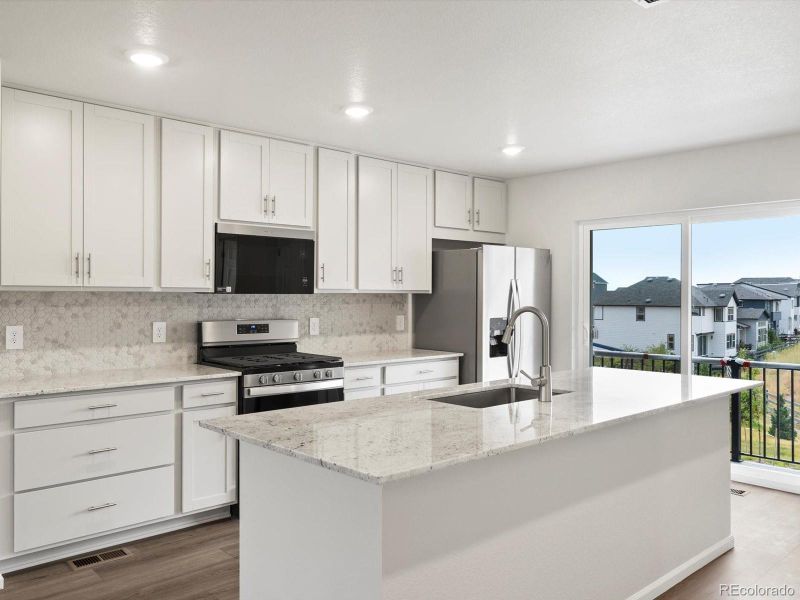 Furnished interior view inside a new home in Three Hills, Morrison (Image 14).