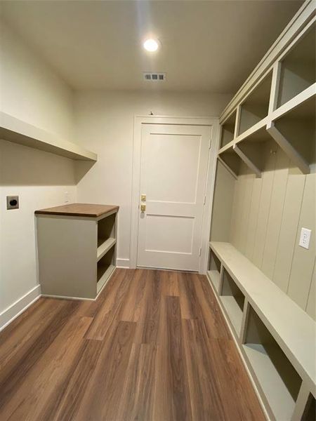 Mudroom featuring dark hardwood / wood-style floors