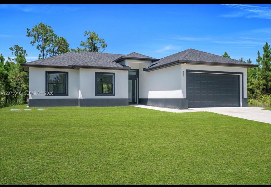 Front exterior of a new home in , Lehigh Acres, FL, highlighting curb appeal (Image 20).