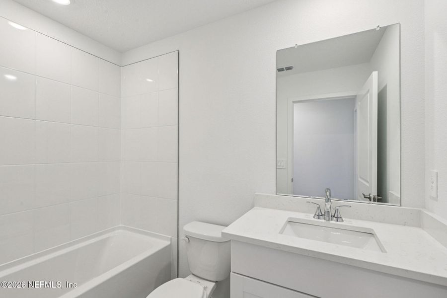 Furnished interior view inside a new home in Colbert Landings, Palm Coast (Image 11).