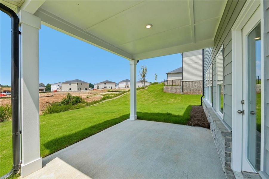 Exterior details and patio area of a home in Preserve at Mountain Creek, Pendergrass (Image 24).