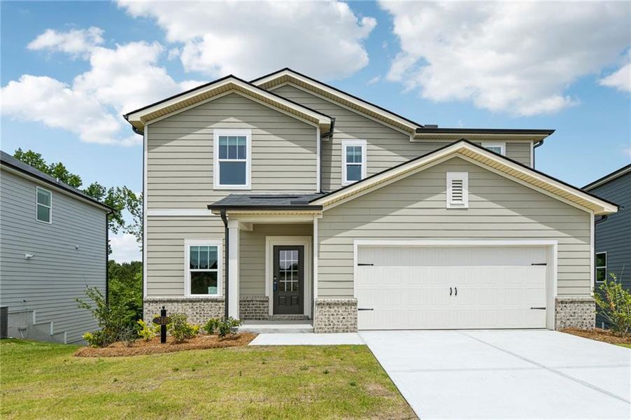 Front exterior of a new home in Ivey Township, Dallas, GA, highlighting curb appeal (Image 21).