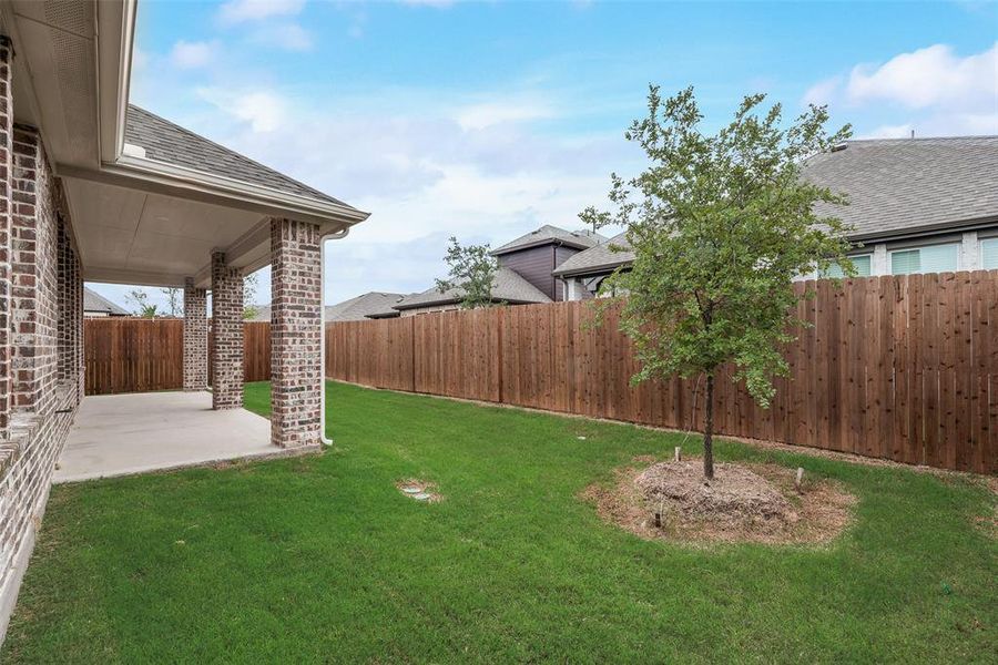 Front exterior of a new home in Villages of Hurricane Creek, Anna, TX, highlighting curb appeal (Image 17).