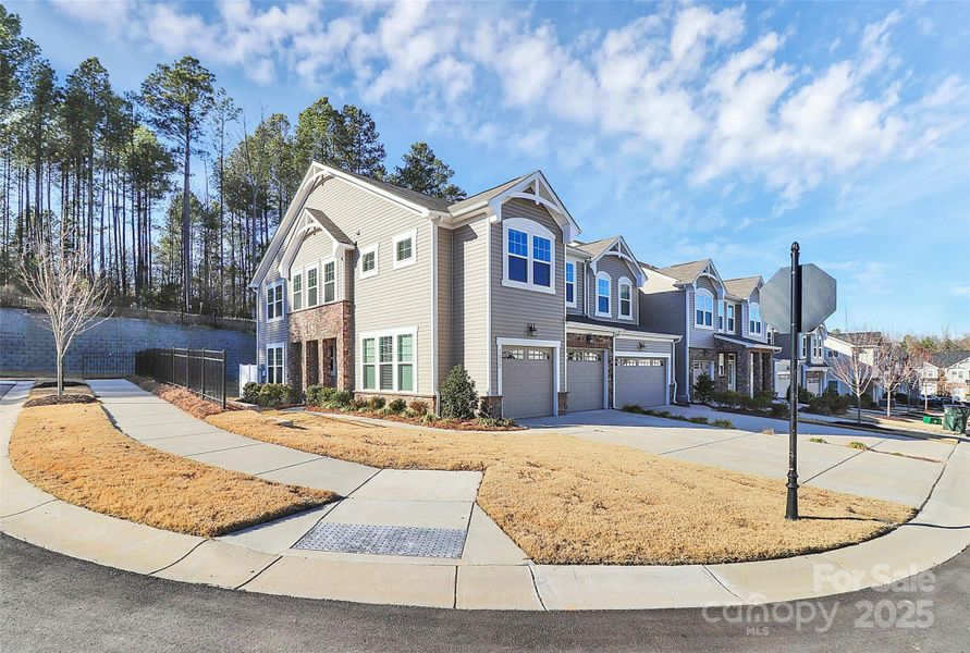 Front exterior of a new home in Somerset, Fort Mill, SC, highlighting curb appeal (Image 2). Front exterior of a new home in Somerset, Fort Mill, SC, highlighting curb appeal (Image 2).