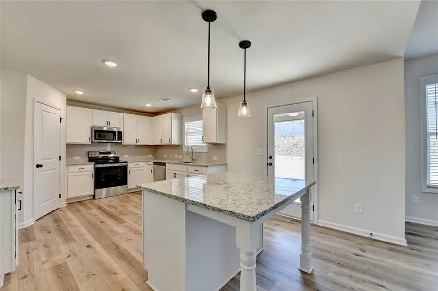 Furnished interior view inside a new home in , Auburn (Image 6).