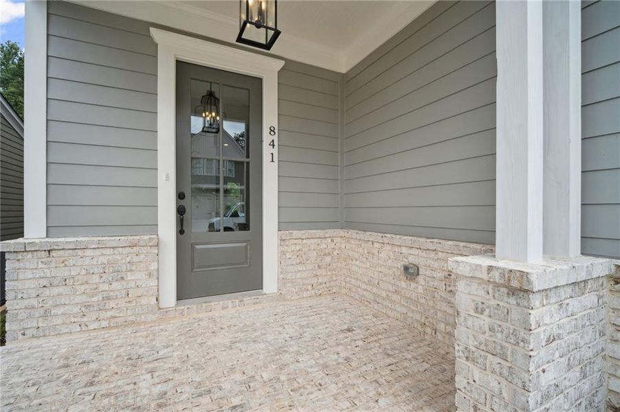 Exterior details and patio area of a home in Lakeside at River Green, Canton (Image 26).