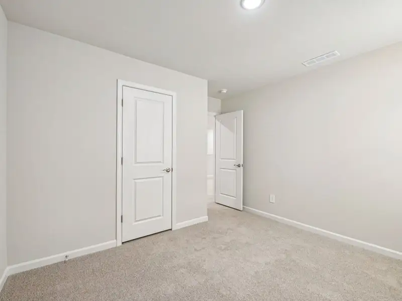 Spacious, unfurnished interior of a new home in Oak Manor - Classic Series, Garner (Image 16). Spacious, unfurnished interior of a new home in Oak Manor - Classic Series, Garner (Image 16).