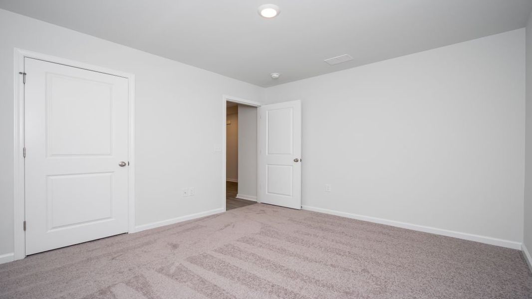 Representative unfurnished interior of a home built from the ARIA by D.R. Horton in The Meadows at Wildwood Village, Shallotte (Image 17). Representative unfurnished interior of a home built from the ARIA by D.R. Horton in The Meadows at Wildwood Village, Shallotte (Image 17).
