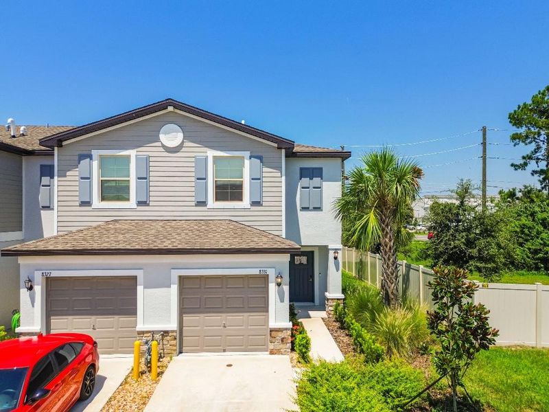 Front exterior of a new home in , New Port Richey, FL, highlighting curb appeal (Image 19).