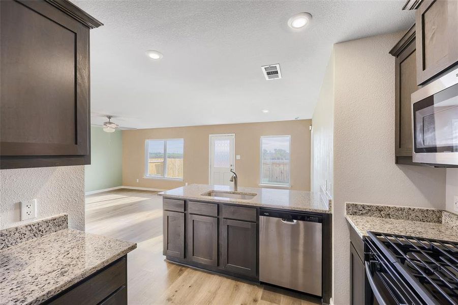 Furnished interior view inside a new home in Patriot Estates, Venus (Image 9).