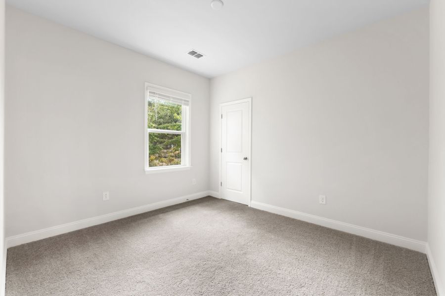 Spacious, unfurnished interior of a new home in Solserra, Shallotte (Image 21).