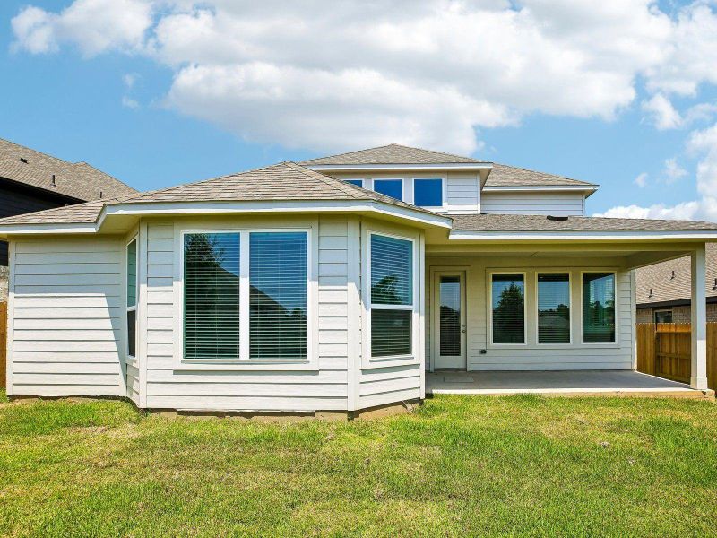 Exterior details and patio area of a home in Pine Lake Cove - Classic Series, Montgomery (Image 4).