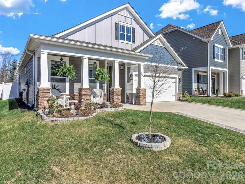 Front exterior of a new home in , Hendersonville, NC, highlighting curb appeal (Image 21).