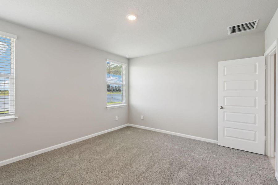 Spacious, unfurnished interior of a new home in Hampton Park - Classic Series, Vero Beach (Image 13). Spacious, unfurnished interior of a new home in Hampton Park - Classic Series, Vero Beach (Image 13).