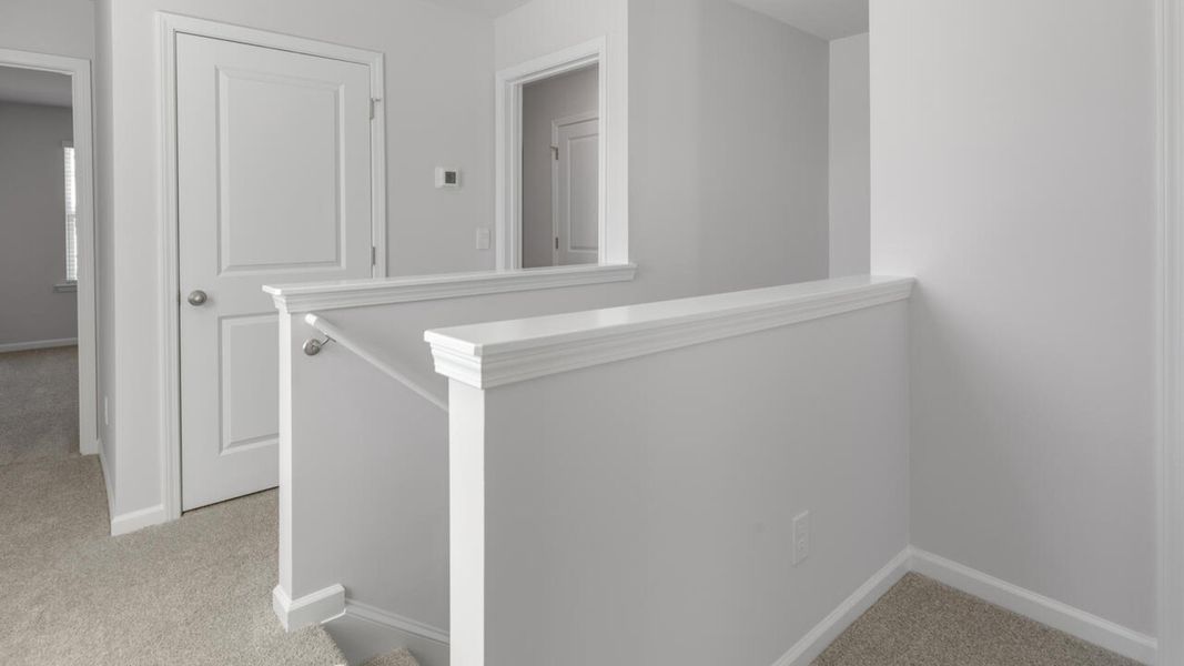 Spacious, unfurnished interior of a new home in The Landing at Sidbury Station, Castle Hayne (Image 18).