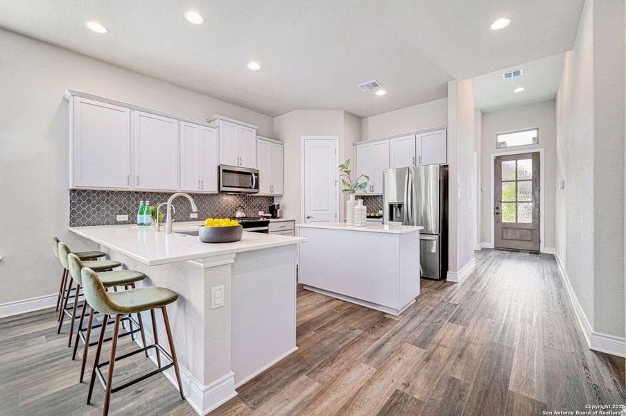 Furnished interior view inside a new home in Elkhorn Ridge At Fair Oaks Ranch: 65's, Boerne (Image 10). Furnished interior view inside a new home in Elkhorn Ridge At Fair Oaks Ranch: 65's, Boerne (Image 10).