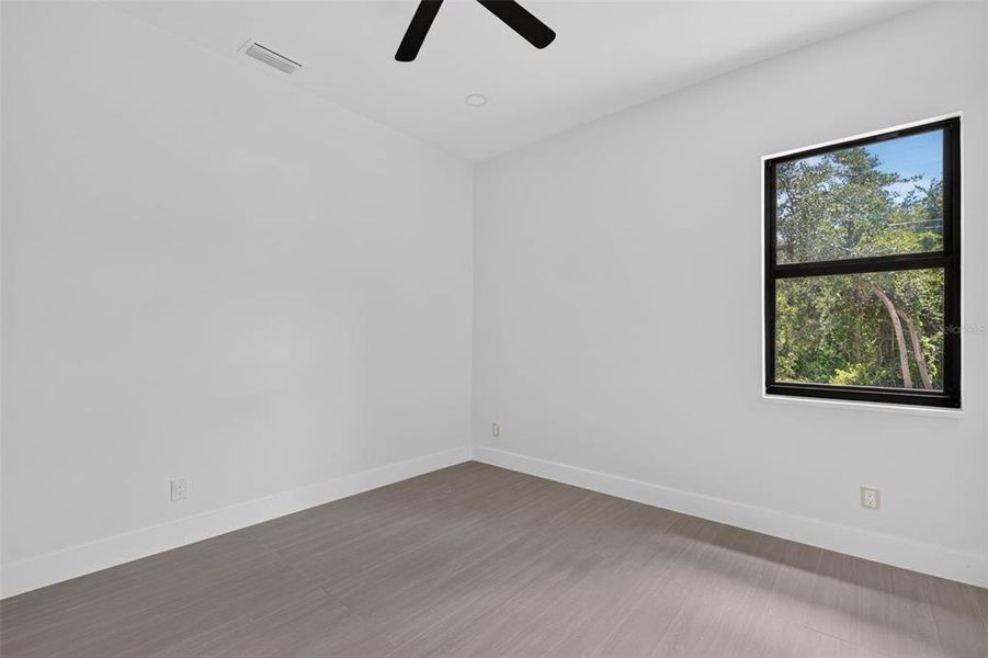 Spacious, unfurnished interior of a new home in , Port Charlotte (Image 18).