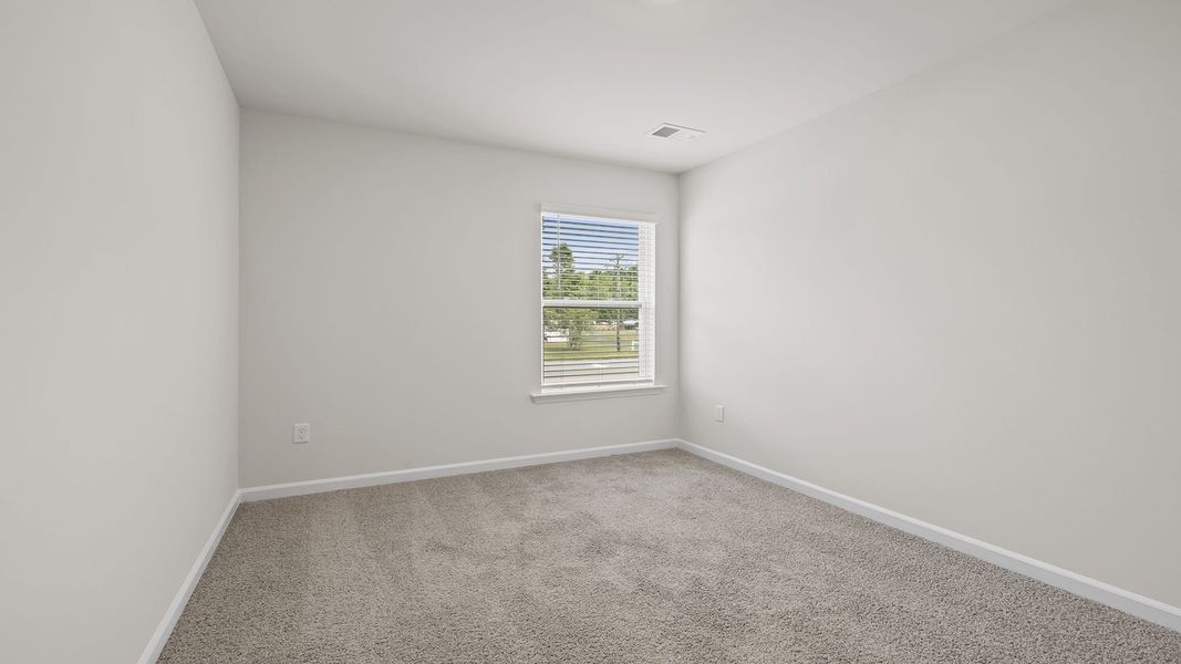 Spacious, unfurnished interior of a new home in Tanglewood Townes, Greenville (Image 23).