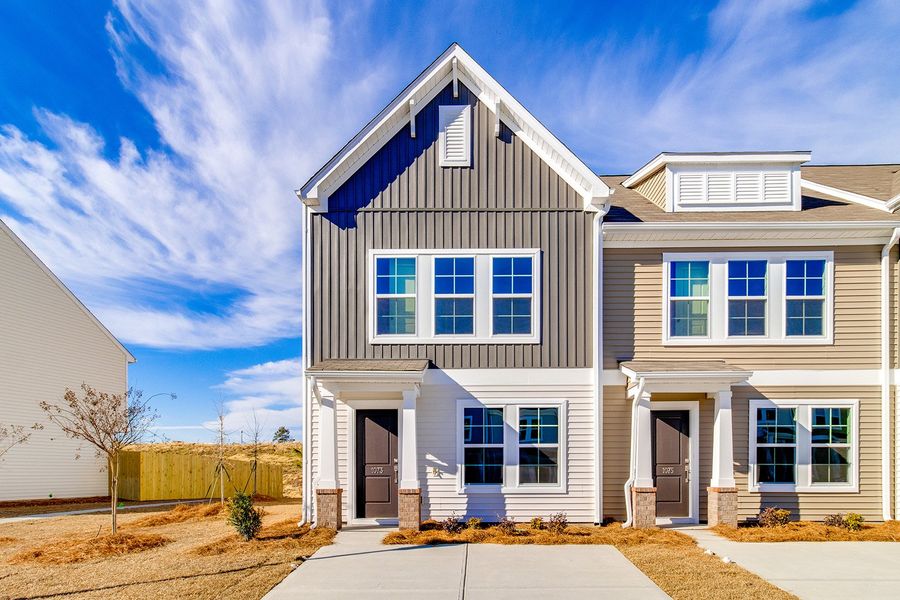 Front exterior of a new home in Astoria, Columbia, SC, highlighting curb appeal (Image 1). Front exterior of a new home in Astoria, Columbia, SC, highlighting curb appeal (Image 1).
