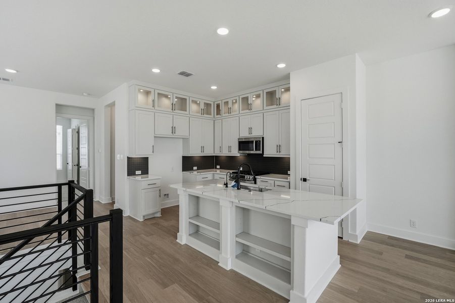 Furnished interior view inside a new home in Centero at Stone Oak, San Antonio (Image 12). Furnished interior view inside a new home in Centero at Stone Oak, San Antonio (Image 12).