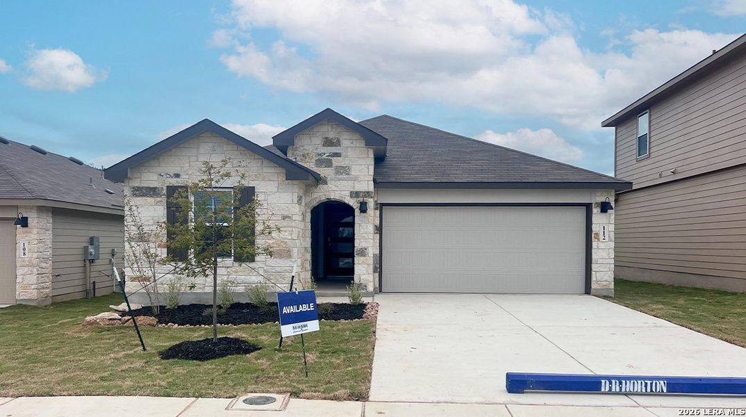 Front exterior of a new home in The Birch at Spencer Ranch, Boerne, TX, highlighting curb appeal (Image 2). Front exterior of a new home in The Birch at Spencer Ranch, Boerne, TX, highlighting curb appeal (Image 2).