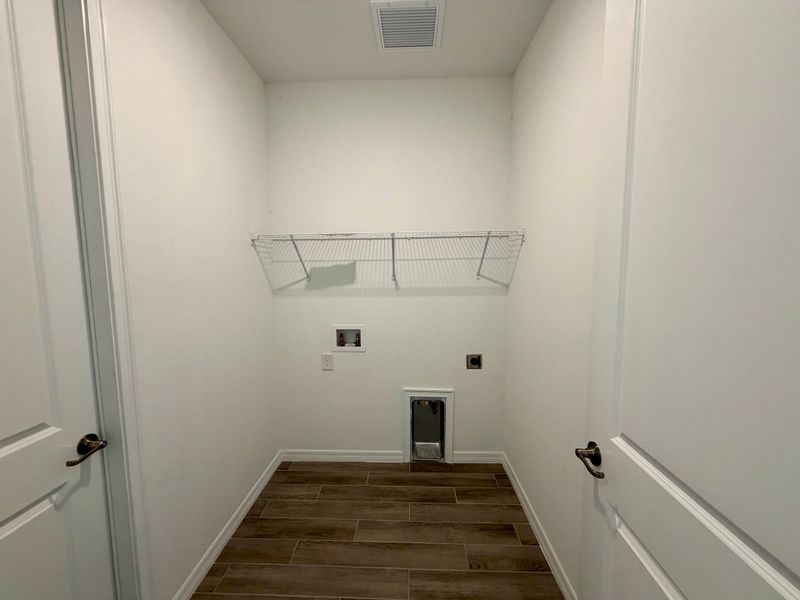 Representative unfurnished interior of a home built from the Juno by William Ryan Homes in The Sanctuary – Resort Collection, Punta Gorda (Image 26).