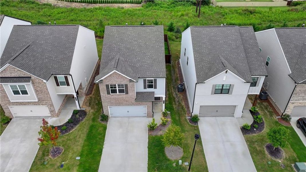 Front exterior of a new home in Westgate Enclave, Loganville, GA, highlighting curb appeal (Image 22).