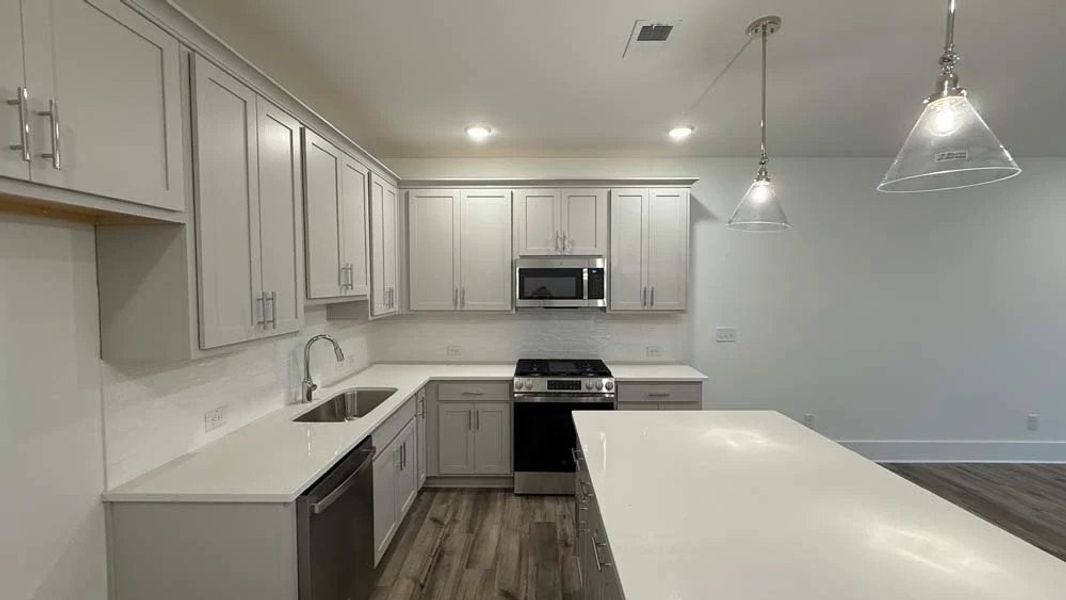 Kitchen featuring Milan Collection Finishes Construction Progress