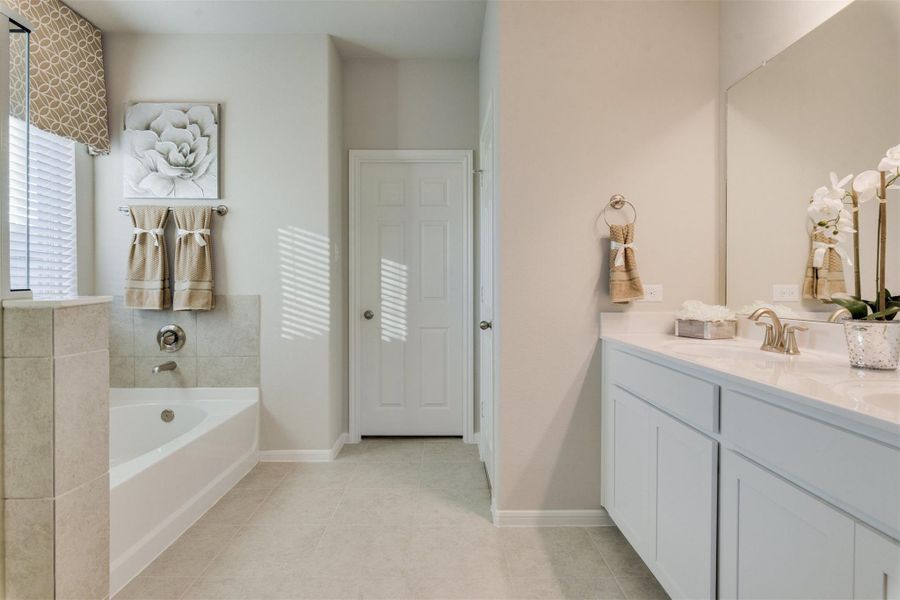 Furnished interior view inside a new home in Sunterra, Katy (Image 25).