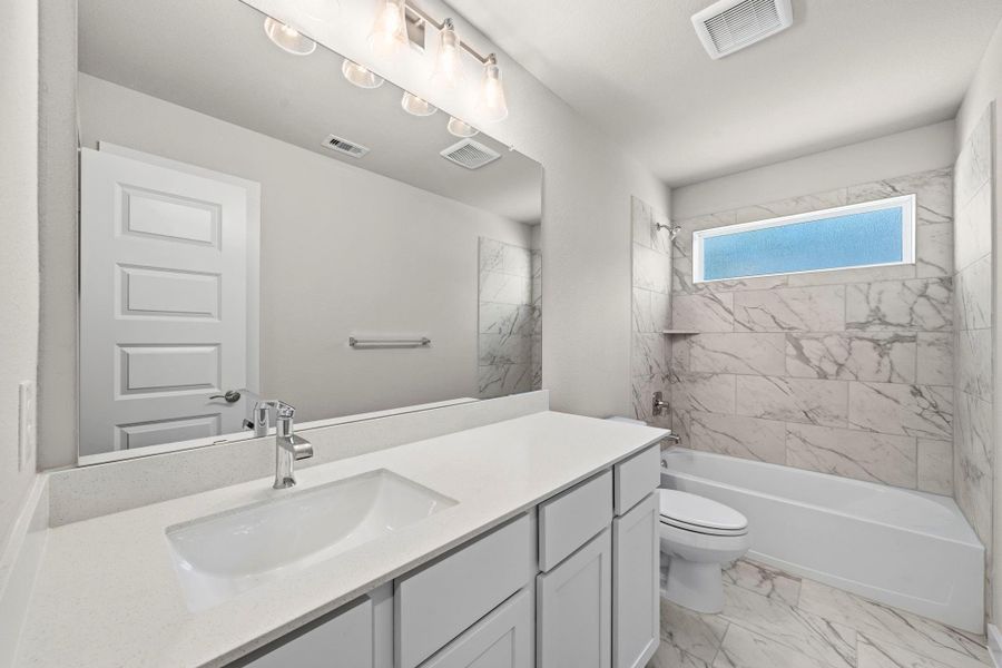 Furnished interior view inside a new home in Barton Creek Ranch, Conroe (Image 8).