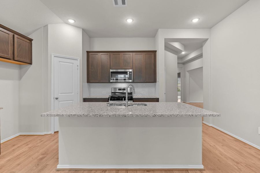 Furnished interior view inside a new home in The Highlands, Porter (Image 6).
