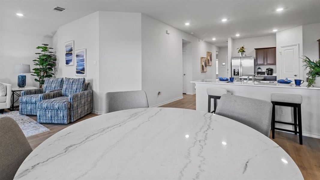 Dining area featuring recessed lighting and light wood finished floors Dining area featuring recessed lighting and light wood finished floors