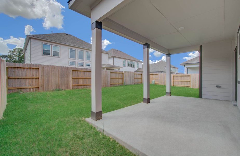 Exterior details and patio area of a home in Harmony Cove, Humble (Image 25).