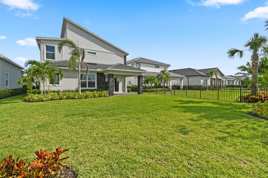 Exterior details and patio area of a home in Avondale at Avenir, Palm Beach Gardens (Image 2).