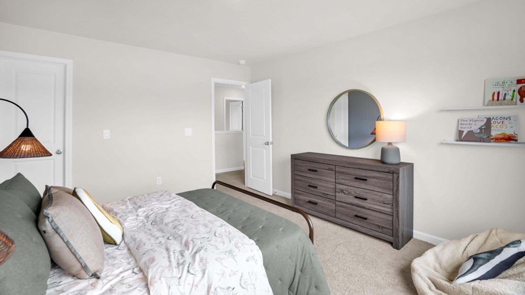 Representative furnished interior of a home built from the WILMINGTON by D.R. Horton in Shahbain Reserve, Raeford (Image 27).