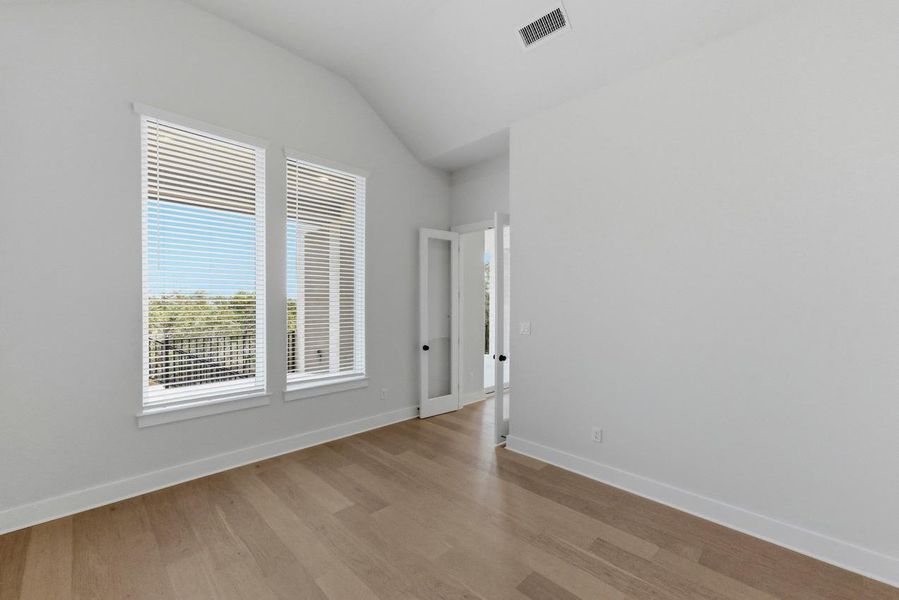 Spacious, unfurnished interior of a new home in Parkside On The River, Georgetown (Image 25).