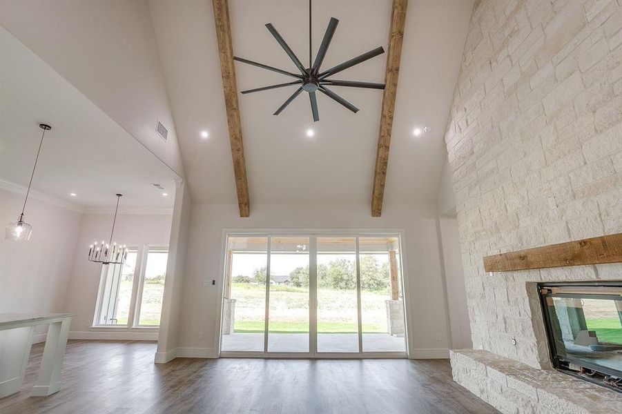 LED lighting, ceiling fan and grand slider patio doors.