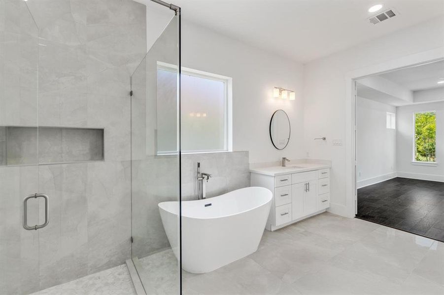 Beautiful, soaker tub and extra large walk-in shower