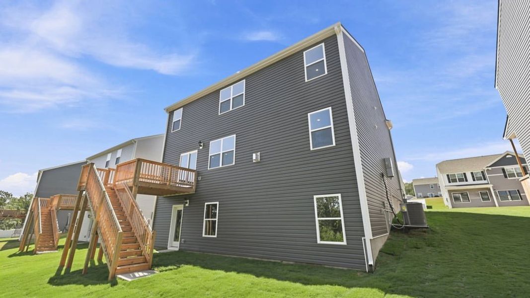 Exterior details and patio area of a home in Spring Ridge, Anderson (Image 29).