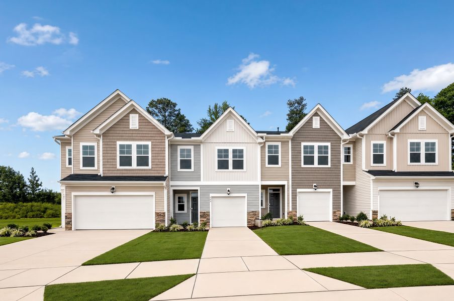 Front exterior of a new home in Marelli, Sanford, NC, highlighting curb appeal (Image 1). Front exterior of a new home in Marelli, Sanford, NC, highlighting curb appeal (Image 1).