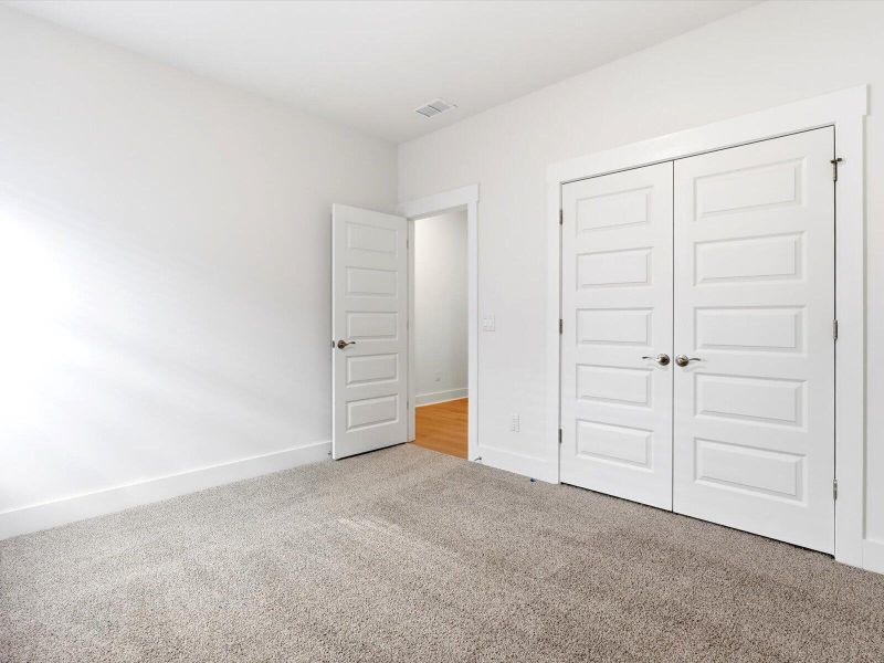Spacious, unfurnished interior of a new home in The Coves at Lakes of Cane Bay, Summerville (Image 50). Spacious, unfurnished interior of a new home in The Coves at Lakes of Cane Bay, Summerville (Image 50).