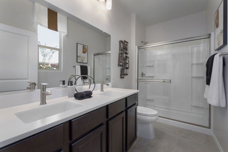 Dual-sink vanity at primary bath