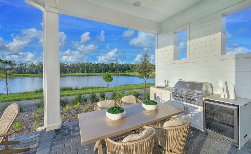 Exterior details and patio area of a home in Weslyn Park at Sunbridge, St. Cloud (Image 3).