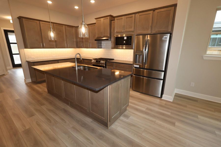 Furnished interior view inside a new home in , Cypress (Image 3).