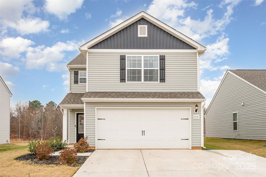 Front exterior of a new home in , Charlotte, NC, highlighting curb appeal (Image 2).
