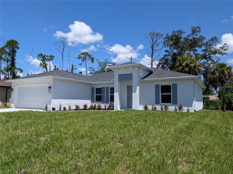 Exterior details and patio area of a home in , North Port (Image 24).