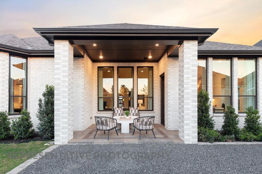 Exterior details and patio area of a home in Riceland: 65ft. lots, Mont Belvieu (Image 24).