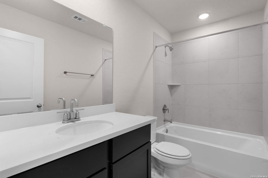 Furnished interior view inside a new home in Westridge, San Antonio (Image 9).